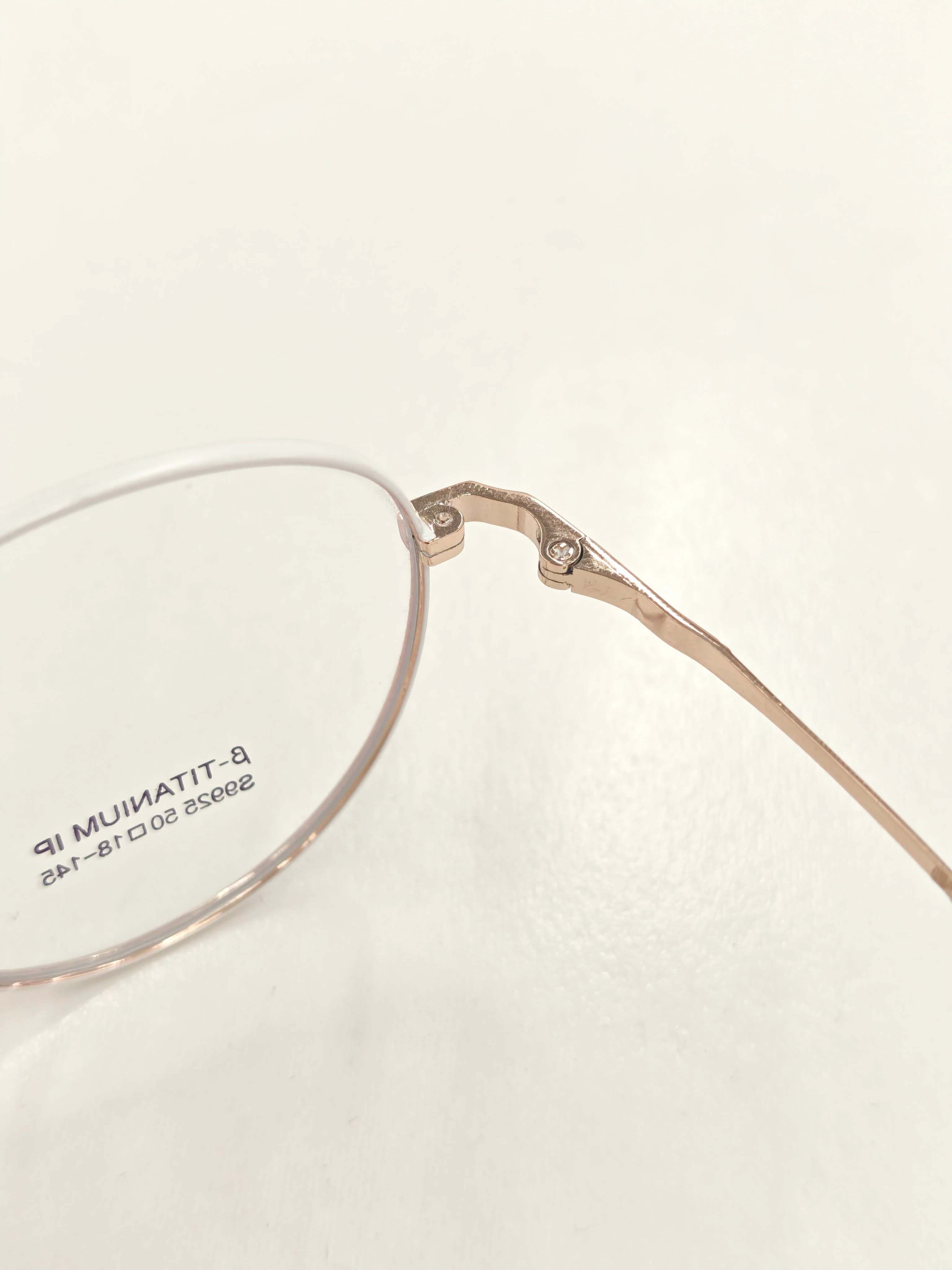 White-framed Gold Eyeglasses - Image 6