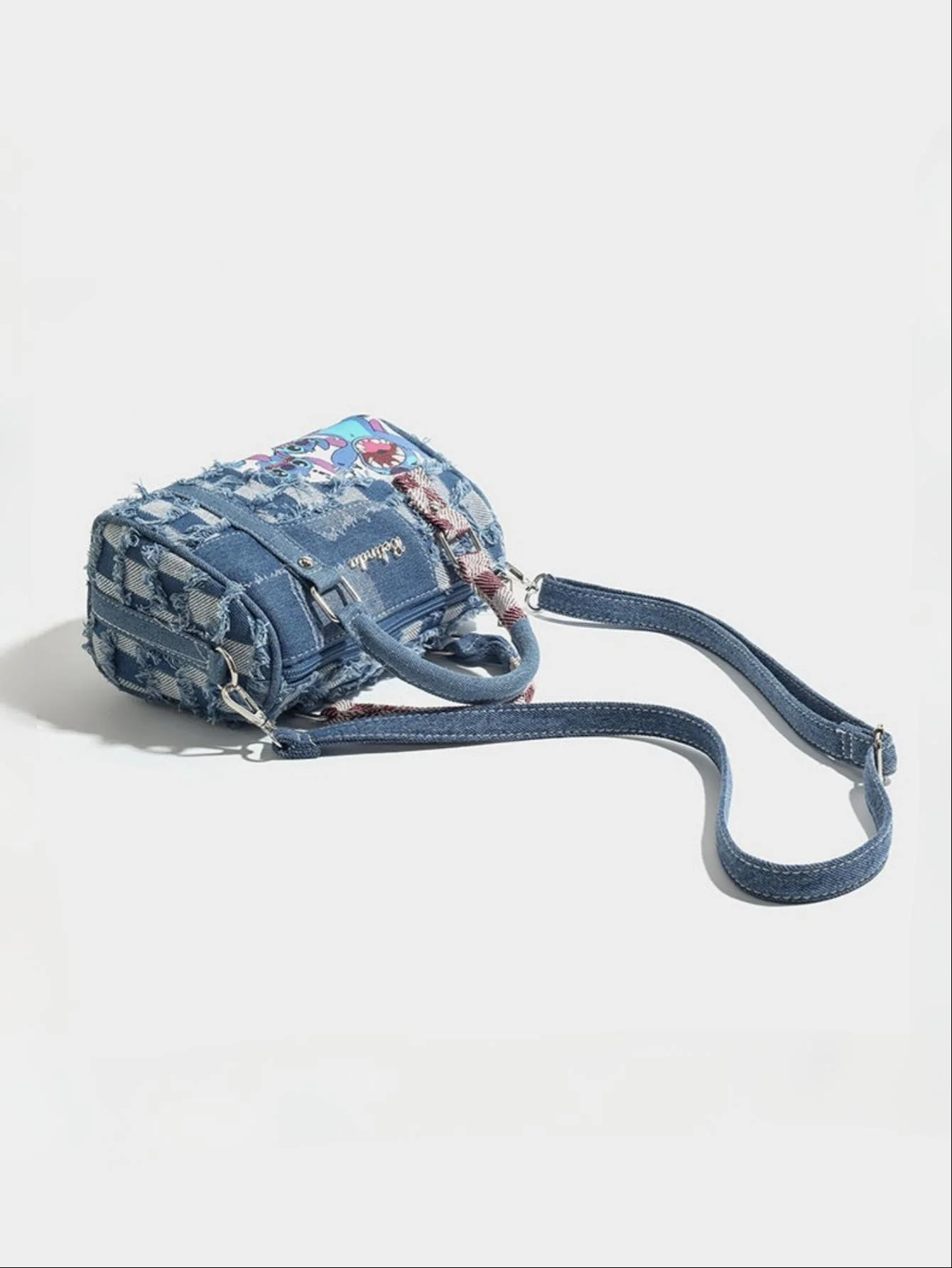 Stitch-themed Denim Patchwork Handbag - Image 6